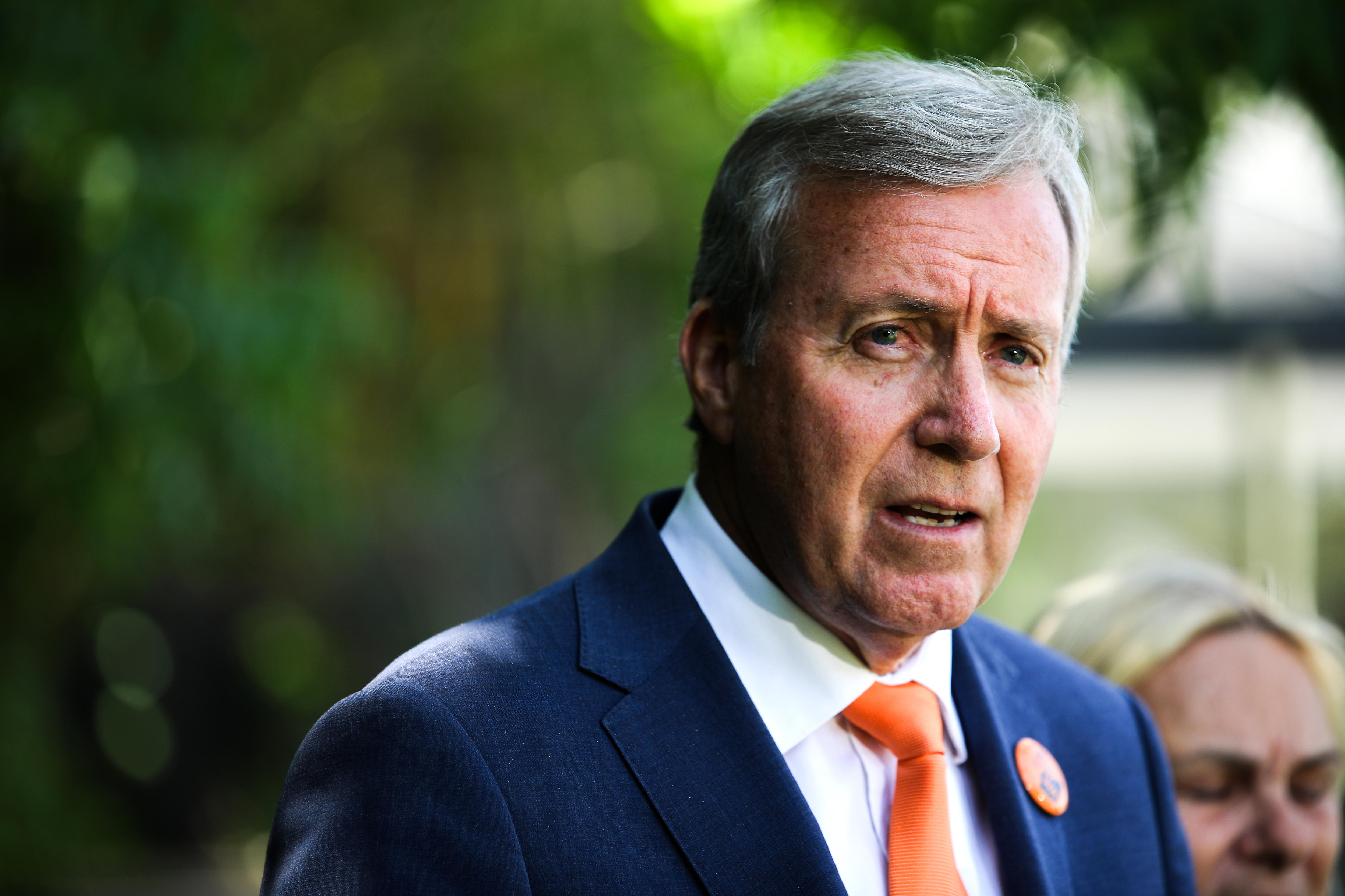 Close up of Reece Whitby in headshot speaking.