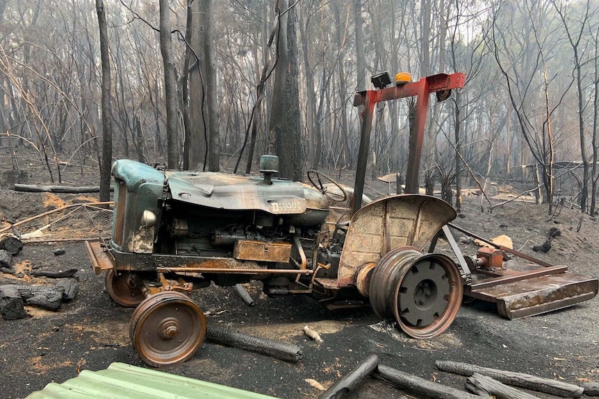 The remains of a tractor destroyed by fire near Walhalla, Victoria.