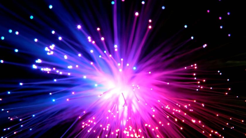 Light streams through fibre optic cables