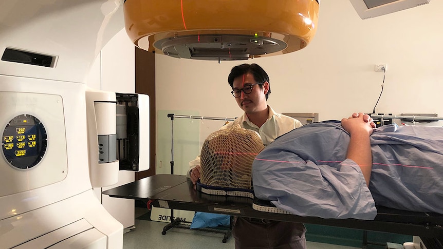 A patient receiving radiation during cancer treatment