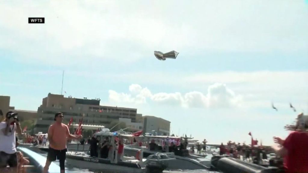 Tom Brady throws the Lombardi Trophy during Super Bowl Champion Boat Parade  