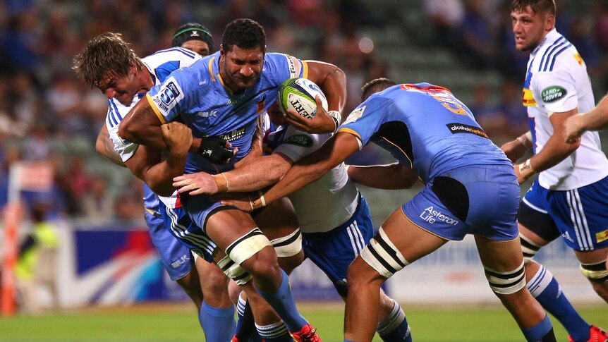 Tight defence ... The Force's Steve Mafi  attempts to break a Stormers tackle