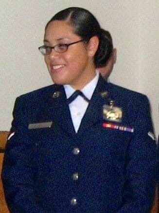 A young woman in a US Air Force dress uniform