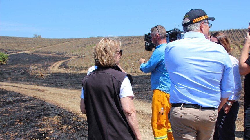 Scott Morrison visits the Adelaide Hills fire ground amid blackened hillsides.
