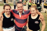 Woodchopping sister Lucy and Kate Backhouse with father Howard