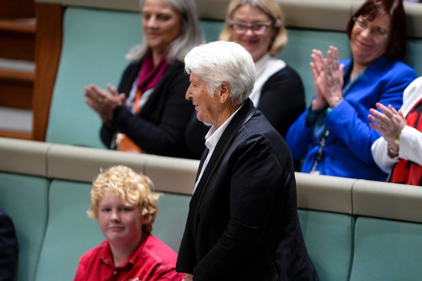 Swimming great Dawn Fraser is acknowledged by Prime Minister of Japan Shinzo Abe.