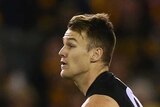 Robbie Gray looks to pass against Hawthorn