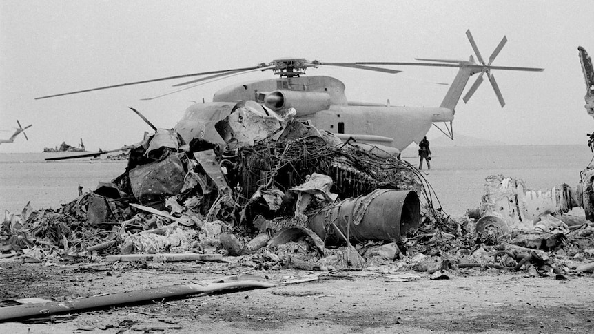 An old photo of the charred remains of a helicopter