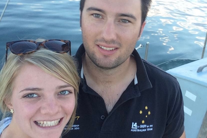 selfie of man and woman on boat, both are clearly keen sailers