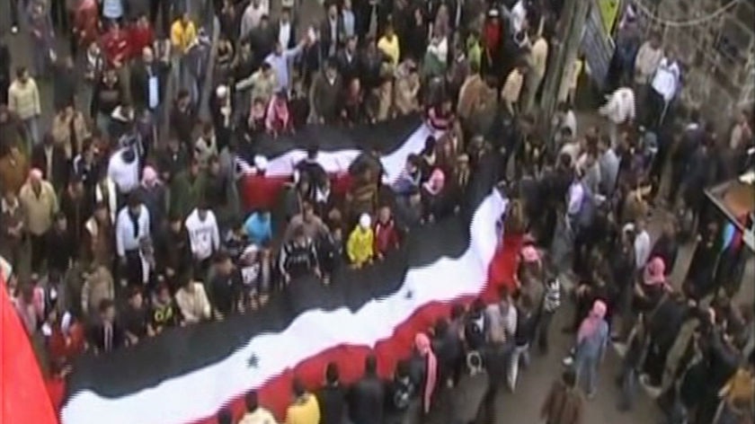 Mourners march in Syria