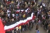 Mourners march in Syria