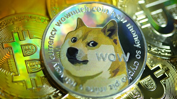 Digital cryptocurrencies, Dogecoin and Bitcoin with a dog on it