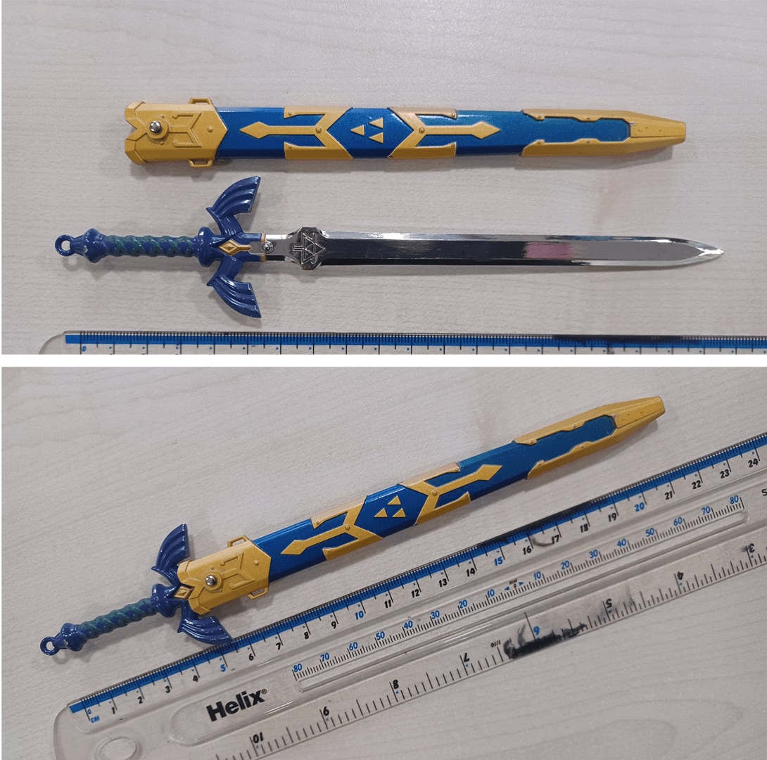 A sword next to next a ruler 