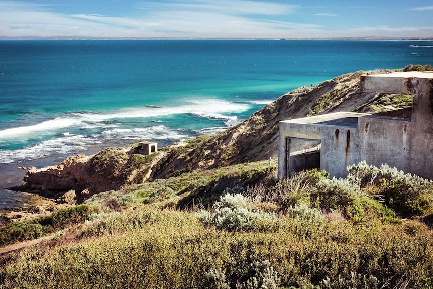 Concrete bunkers overlooking the ocean.