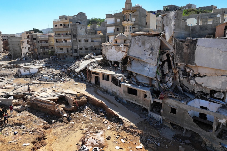 Destroyed facades of multi-storey apartment buildings in Derna