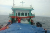 Passengers on board an Indonesian people smugglers' boat