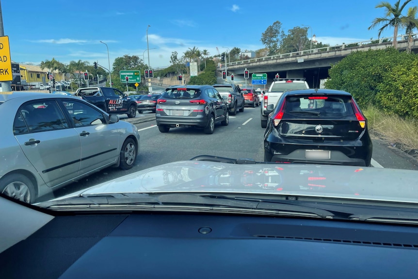 Cars lined up in a traffic jam.