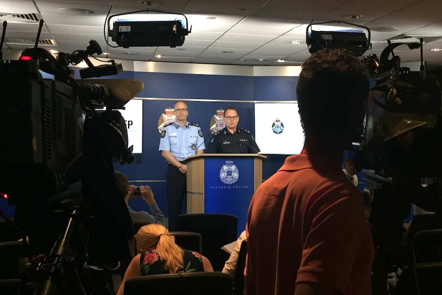 Ian McCartney (left) and Ross Guenther speaking at a press conference.