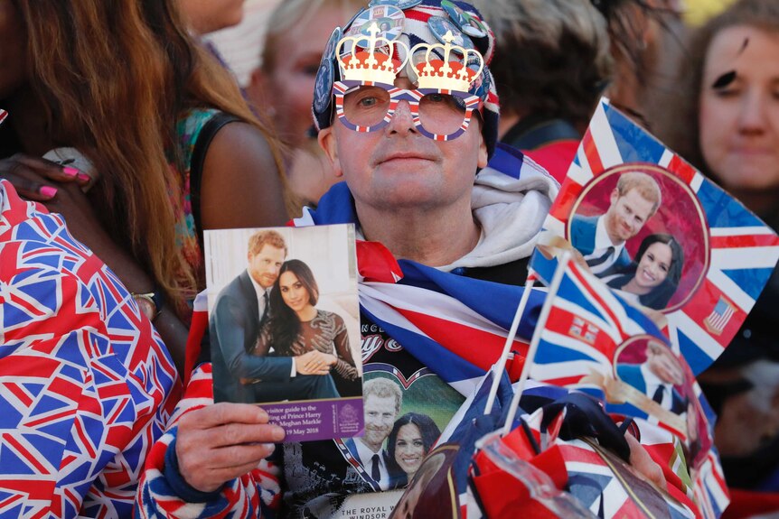 A Royal fan waits for the wedding ceremony of Prince Harry and Meghan Markle.