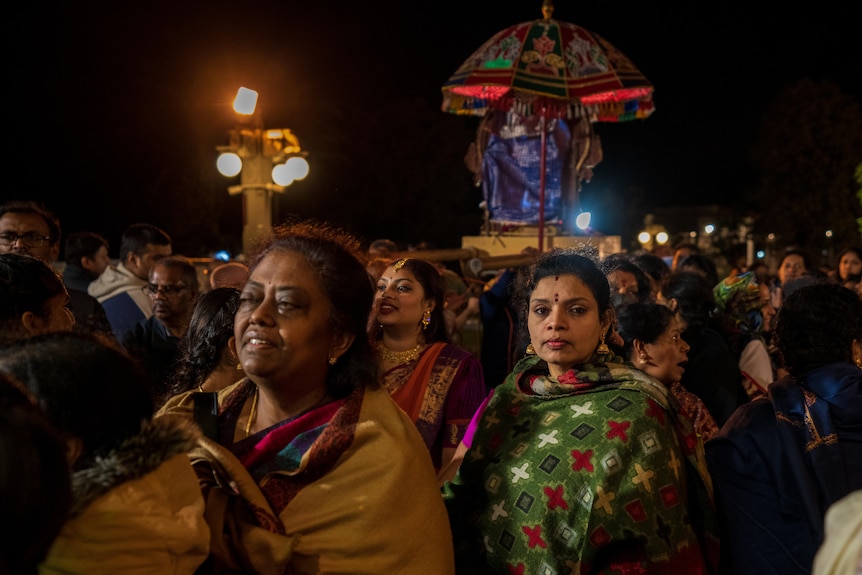 A photo of crowds outside the temple.