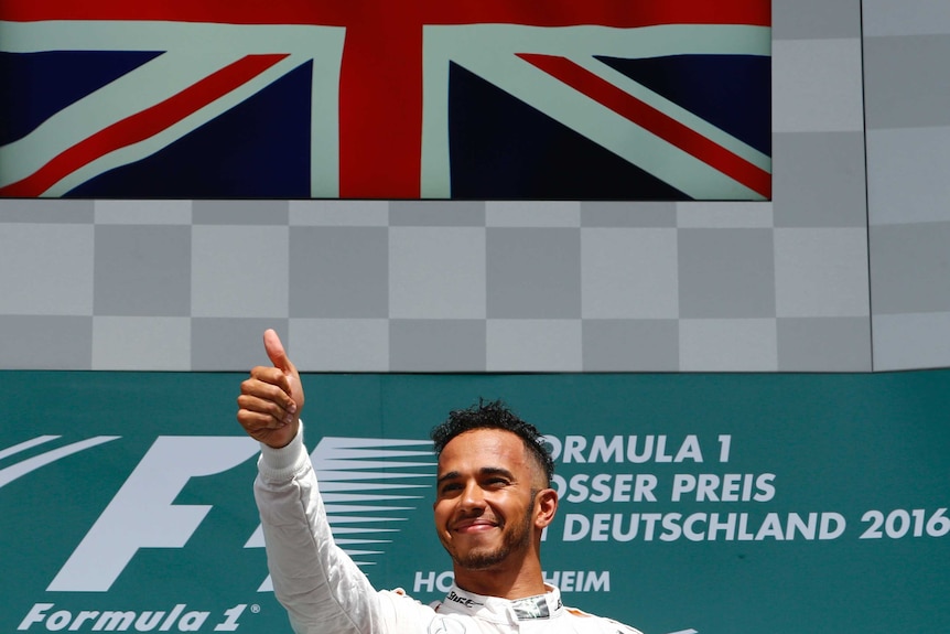 Mercedes' Lewis Hamilton celebrates after winning the 2016 German Grand Prix.