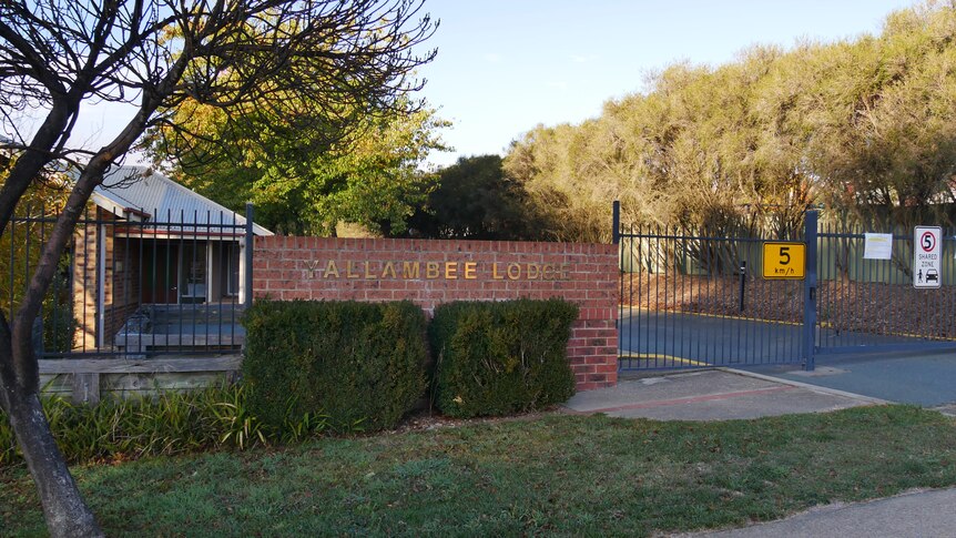 a building sign reading 'Yallambee Lodge'