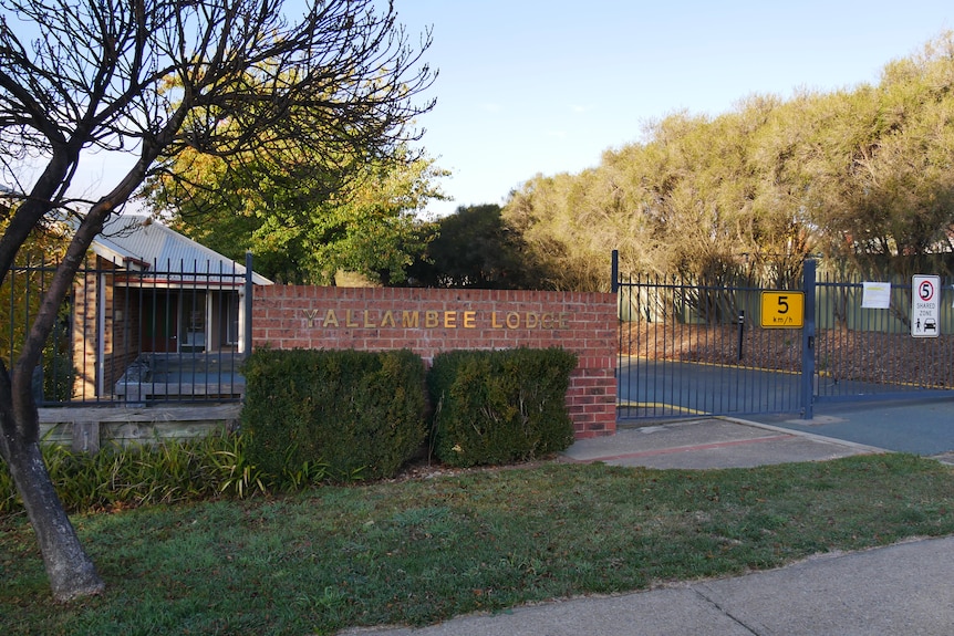 a building sign reading 'Yallambee Lodge'