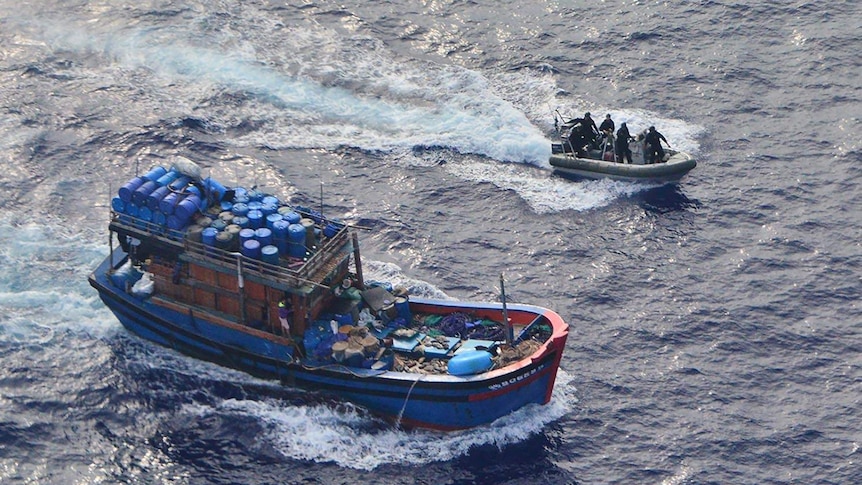 Australian Border Force officers pursuing a foreign fishing boat