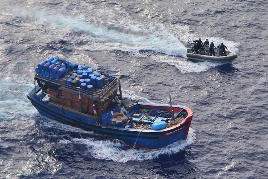 Australian Border Force officers pursuing a foreign fishing boat