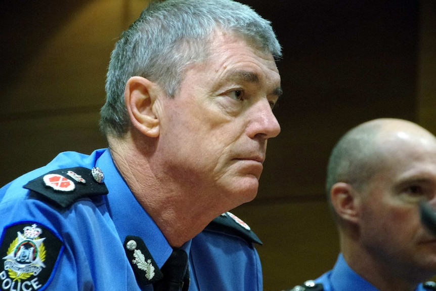 Side profile of WA Police Commissioner Karl O'Callaghan at a WA parliamentary committee hearing in Perth.