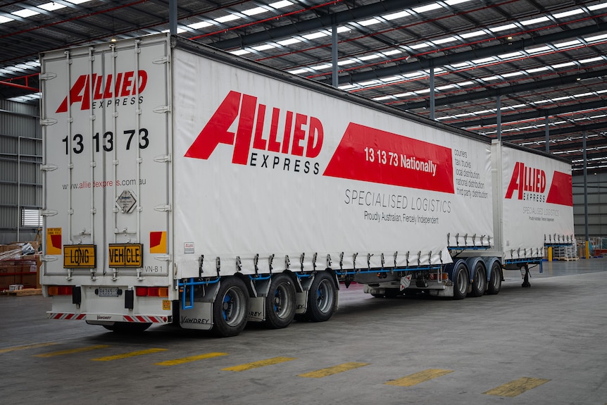 An Allied Express truck in warehouse.