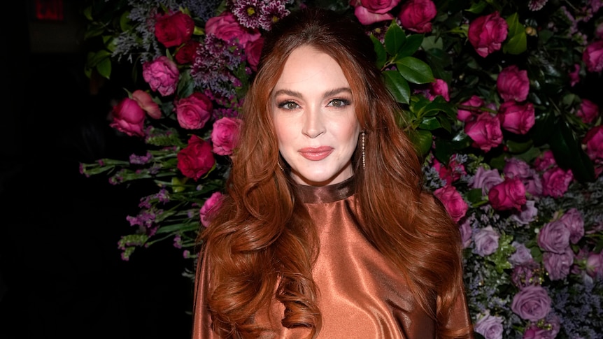 Actress Lindsay Lohan appears at the Christian Siriano Fall/Winter 2023 fashion show in New York.