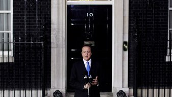 Prime Minister David Cameron stands on the steps of Downing Street on May 11, 2010 (Getty Images: Dan Kitwood)