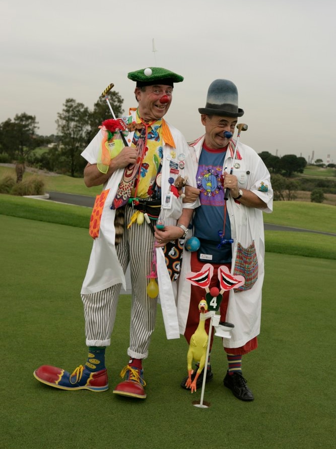 Clown Doctor founders Dr Peter Spitzer and Jean-Paul Bell pose in their clown costumes