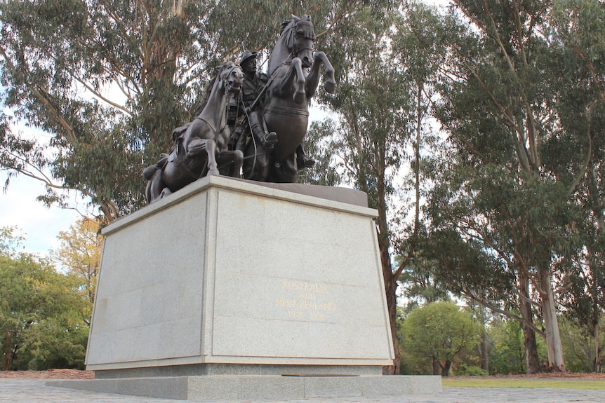 A diorama on Anzac parade featuring soldiers on horseback