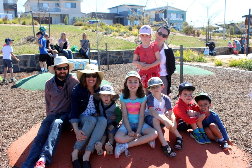 Ben and Miriam English, Shannon Battison and children in Link Park, Wright, October 2017.