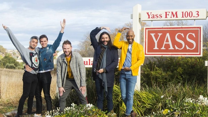 The 'Fab Five' from Queer Eye for the Straight Guy posing with the Yass sign.