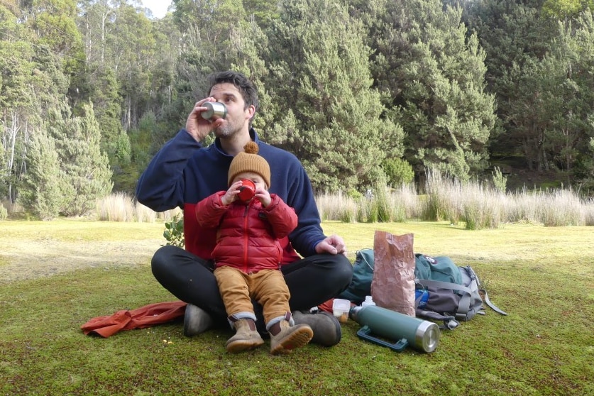 Josh Pringle and his two year old son Rupert drink tea on kunanyi/Mount Wellington.