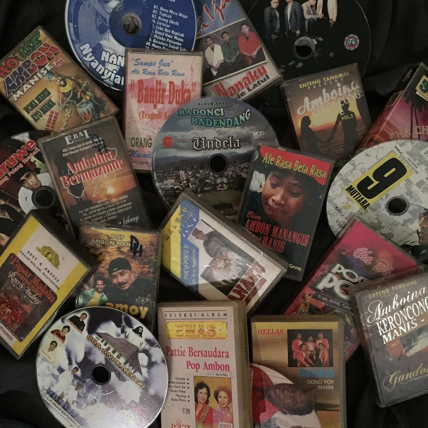 CDs, DVDs and VCR tapes and boxes are arranged to display the output of some of the local musicians.