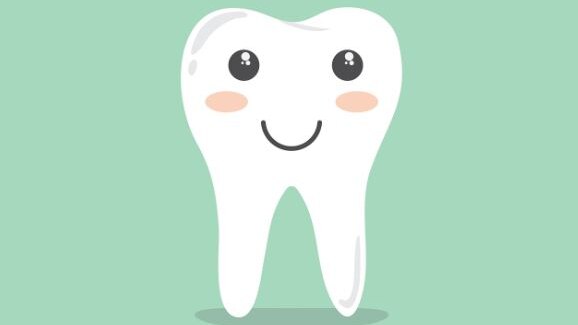 Picture graphic of a cartoon tooth, that is smiling with a light green background 