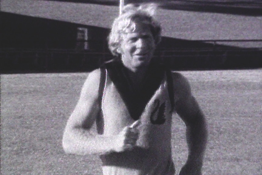 Barry smiles while wearing the WA uniform on the field