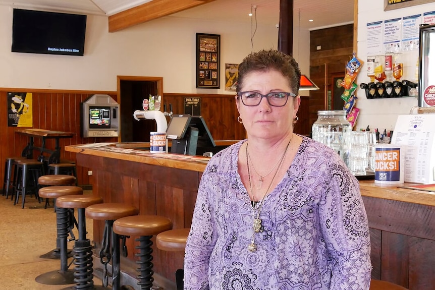 publican Gael McGee standing in front of bar at Heyfield