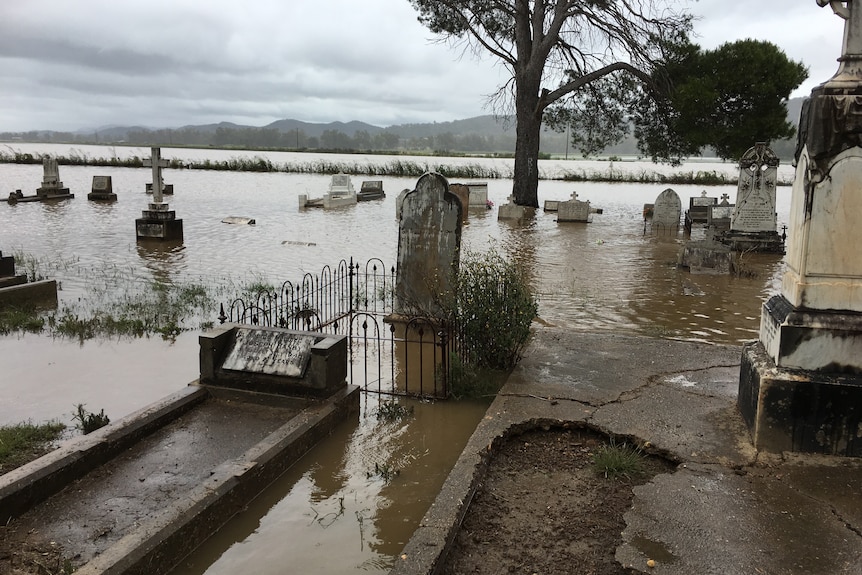 gravestones in floodwater 