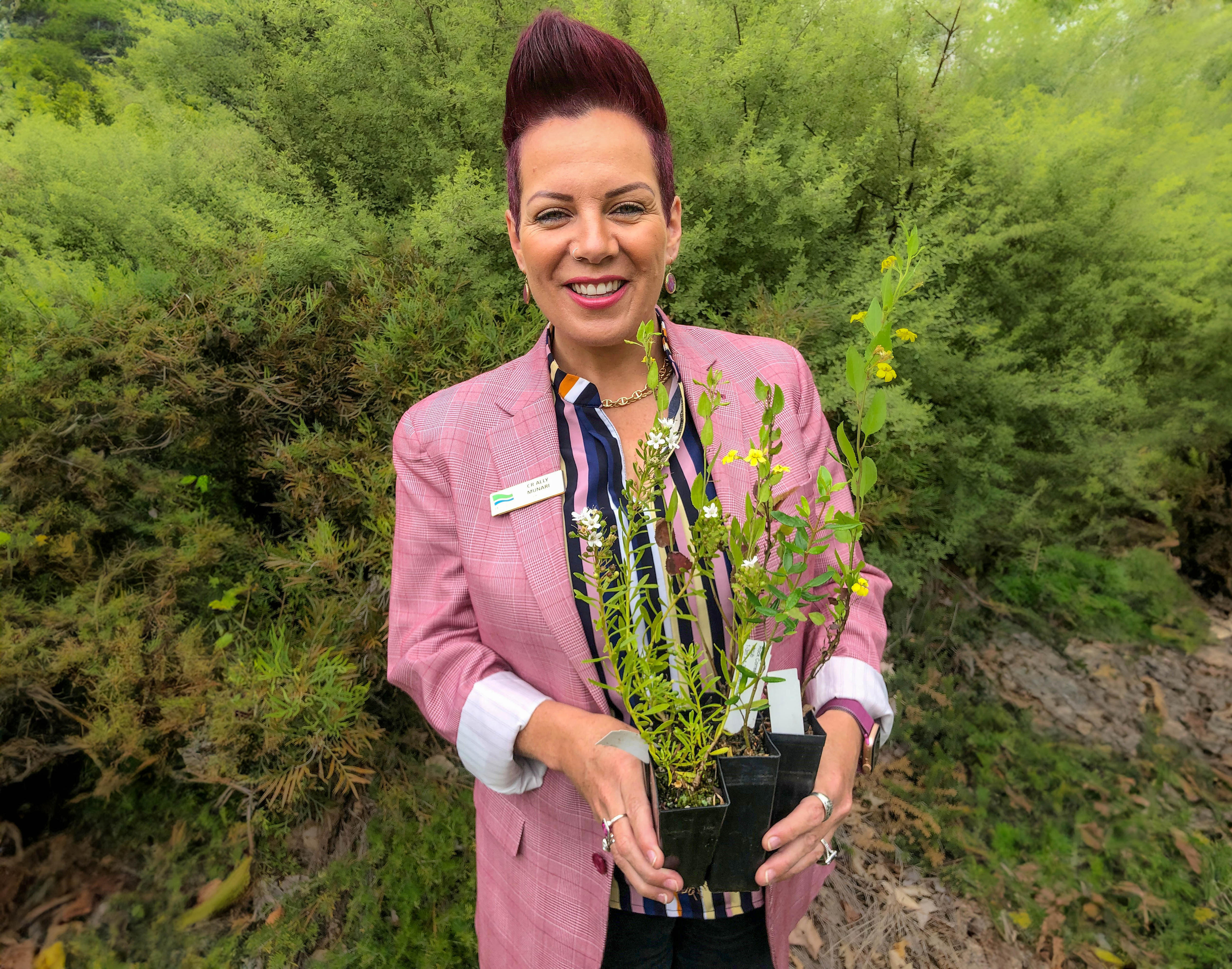 Ally Cunari holding a plant
