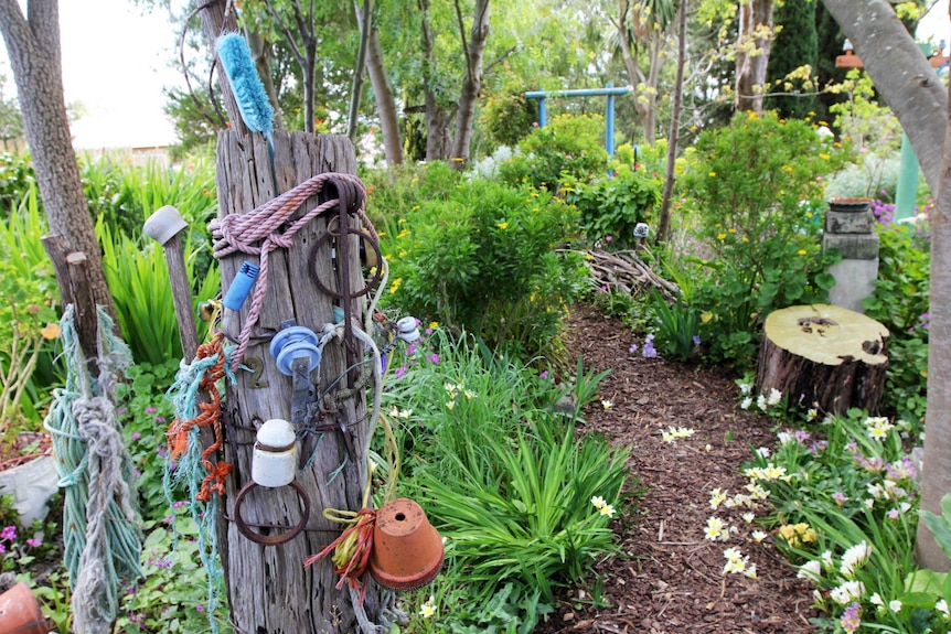 Lorraine's bush-style garden where individual artworks form part of the landscape.