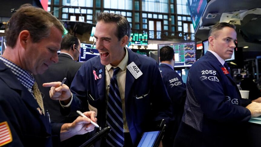Wall Street traders in a happy mood.