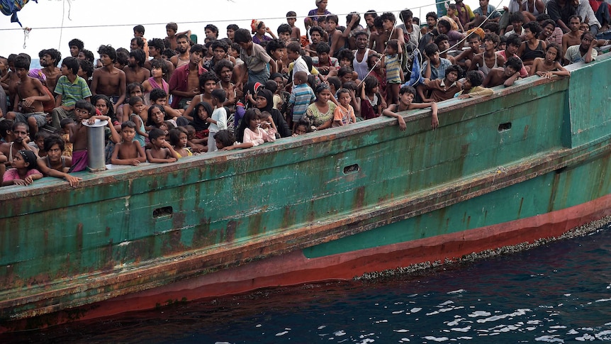 Rohingya migrants on a boat drift in Thai waters on May 14.