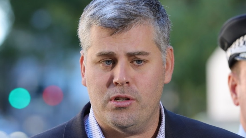 Mark Ryan speaks at a media conference in Brisbane