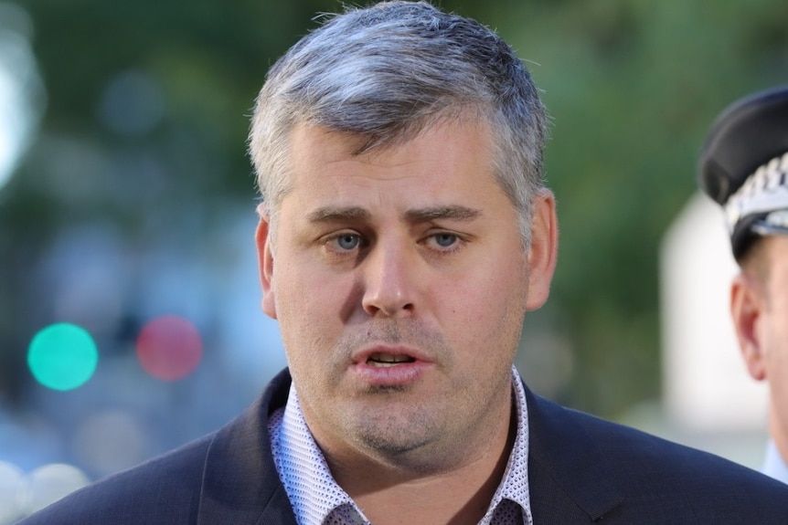 Mark Ryan speaks at a media conference in Brisbane