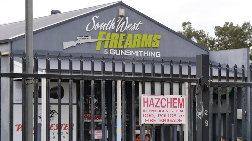 A store front with the words 'South West Firearms and Gunsmithing' written on it.